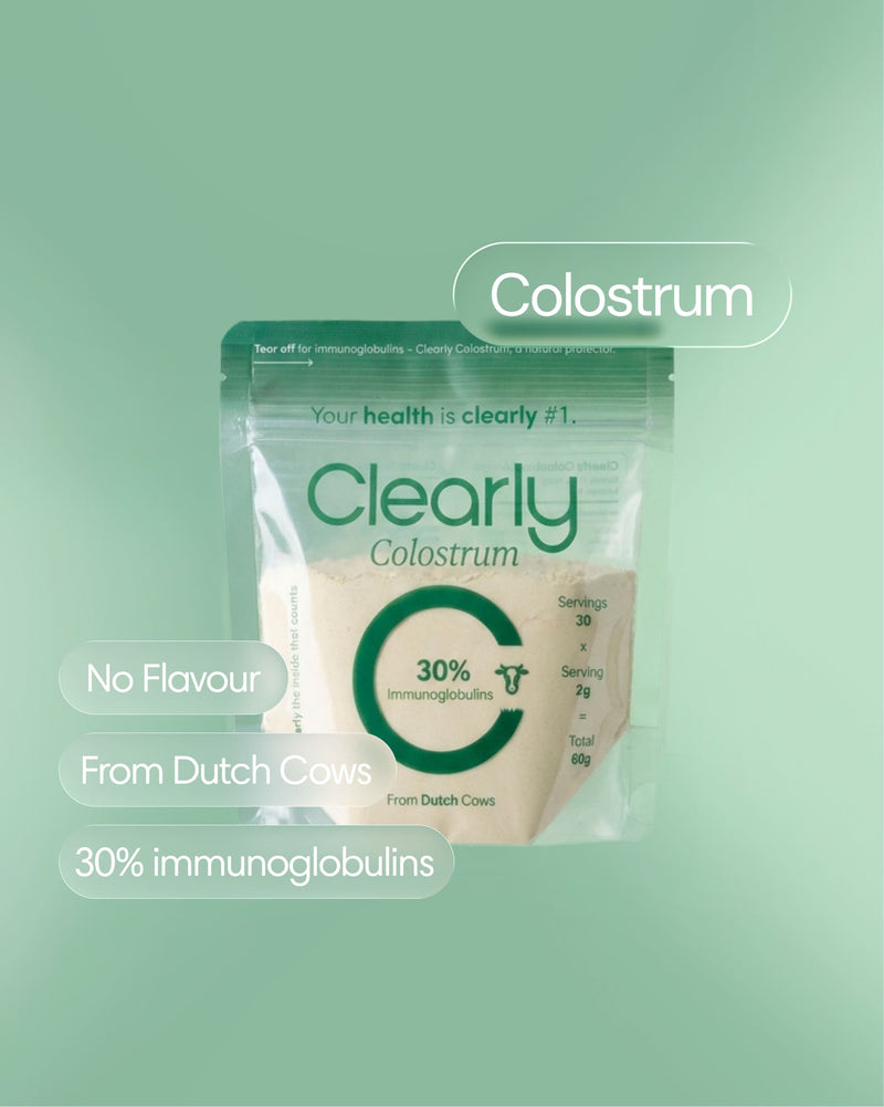 Clearly Colostrum supplement bottle with label visible, showing the front label and product details.